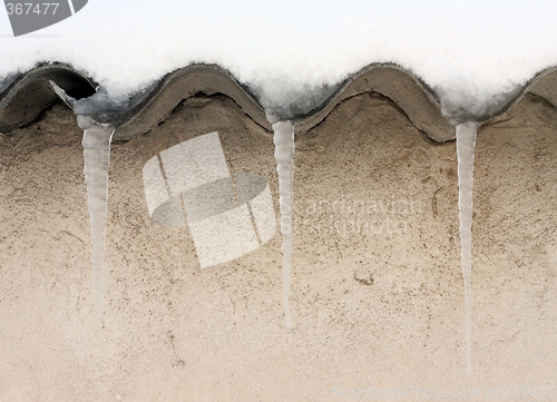 Image of Icicles hanging from roof