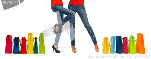 Image of close up of women with shopping bags