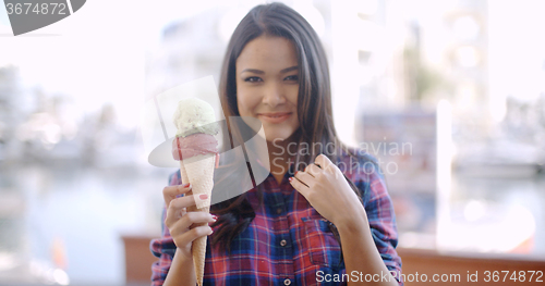 Image of Girl Eating A Delicious Ice Cream