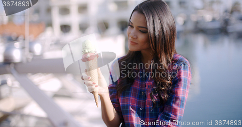 Image of Young Girl Eating Ice Cream