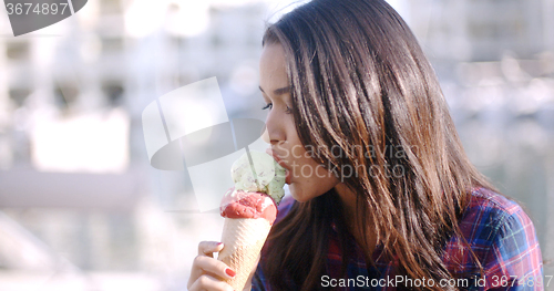 Image of Girl Eating A Delicious Ice Cream