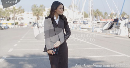 Image of Business Woman Walking On The The Pier