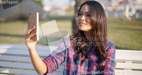 Image of Girl Making Selfie Outdoor
