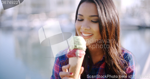 Image of Girl Eating A Delicious Ice Cream
