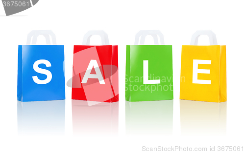 Image of many colorful shopping bags with sale word