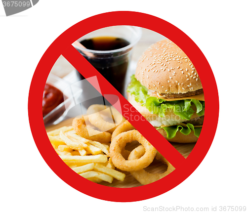 Image of close up of fast food and drink behind no symbol