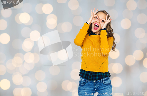 Image of happy young woman or teen girl having fun