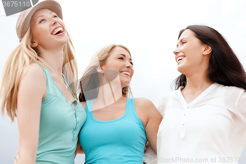 Image of girls looking up in the sky