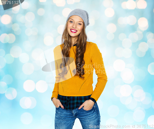 Image of happy young woman or teen girl in casual clothes