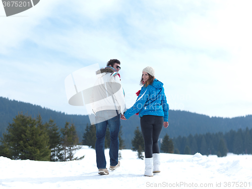 Image of romantic young couple on winter vacation