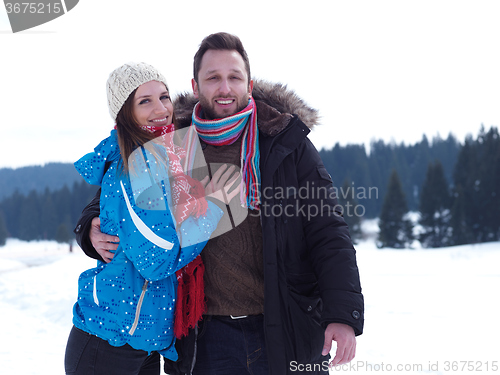 Image of romantic young couple on winter vacation