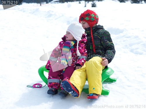 Image of portrait of boy and baby girl on winter vacation