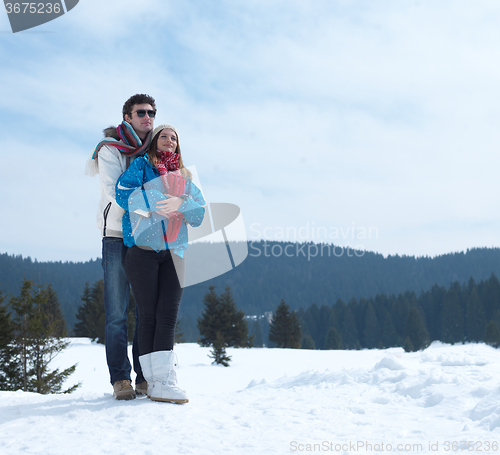 Image of romantic young couple on winter vacation