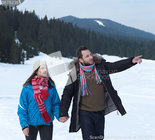 Image of romantic young couple on winter vacation