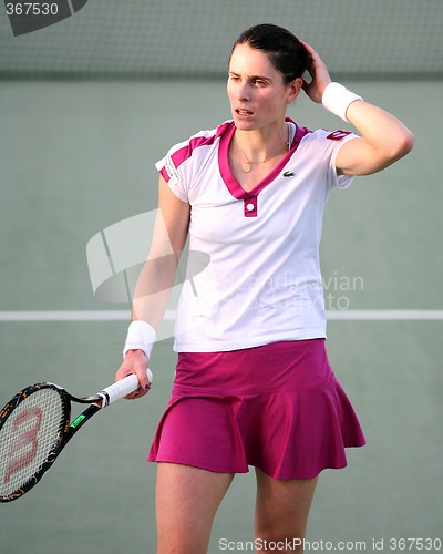 Image of Dechy on court in Qatar