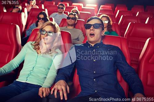 Image of friends watching horror movie in 3d theater