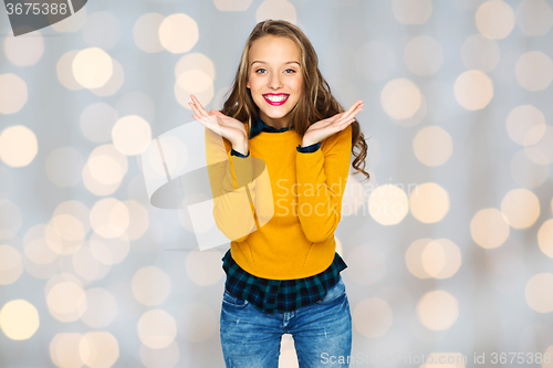 Image of happy young woman or teen girl in casual clothes