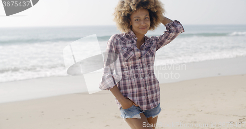 Image of Casual Young Woman Standing At The Beach