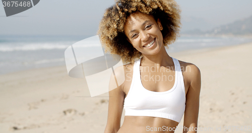 Image of Portrait Of Girl Smiling On Beach