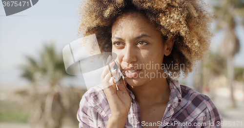 Image of Woman Talking With Mobile Phone