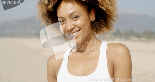 Image of Female Looking And Smiling At Camera
