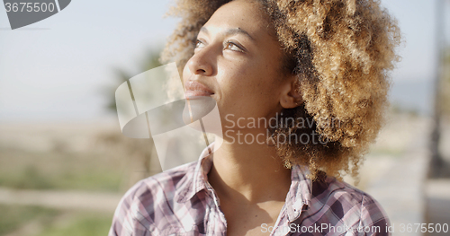 Image of Woman With Happy Expression Relaxing On Nature