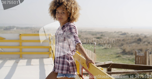 Image of Happy African American Woman Smiling Outdoors
