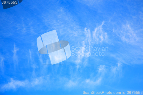 Image of in the blue sky white soft clouds and abstract background