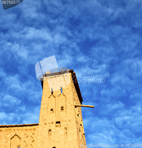 Image of africa  in histoycal maroc  old construction  and the blue cloud