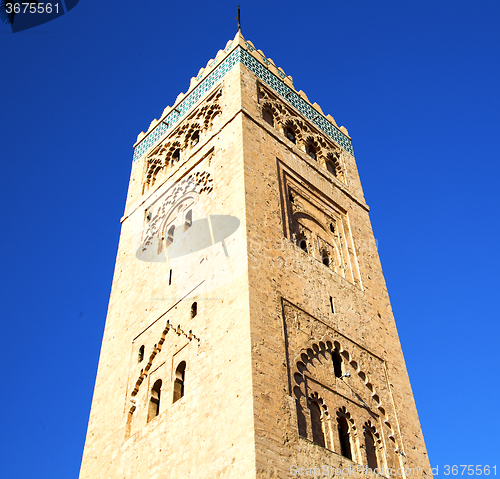 Image of history in maroc africa  minaret religion and the blue     sky