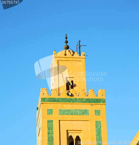 Image of history in maroc africa  minaret religion and the blue     sky