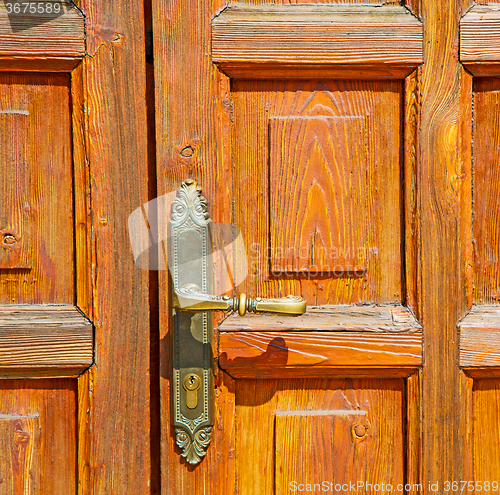 Image of europe old in  italy  antique close brown door and rusty lock  c