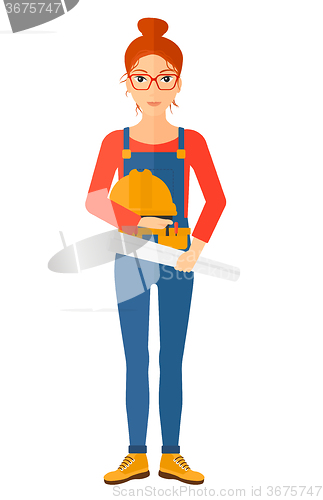 Image of Engineer with hard hat and blueprint.