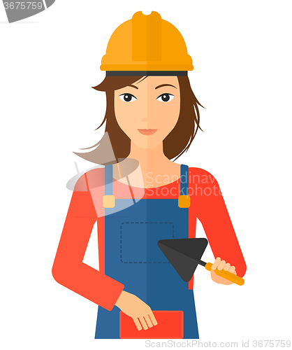 Image of Bricklayer with spatula and brick.