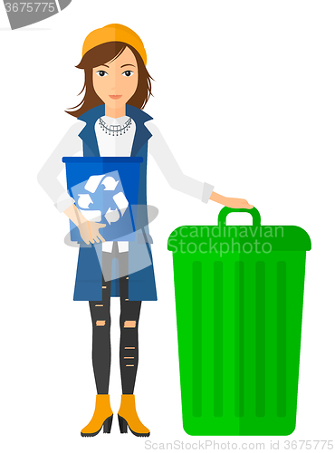 Image of Woman with recycle bins.