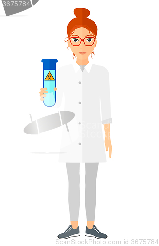 Image of Laboratory assistant with test tube.