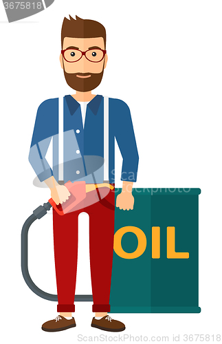 Image of Man with oil can and filling nozzle.