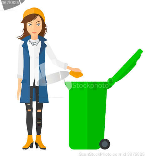 Image of Woman throwing trash.