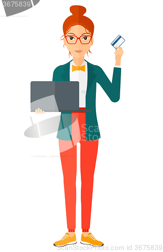 Image of Woman making purchases online.