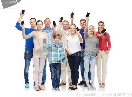 Image of group of smiling people with smartphones
