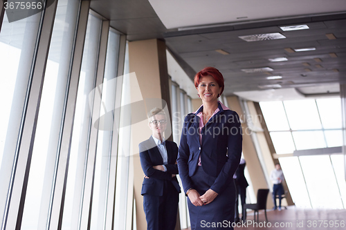Image of business woman goup at modern bright office