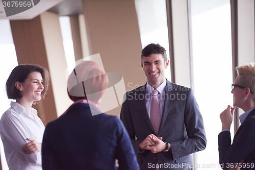 Image of business people group on meeting at modern bright office