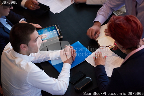 Image of business people group on meeting at modern bright office