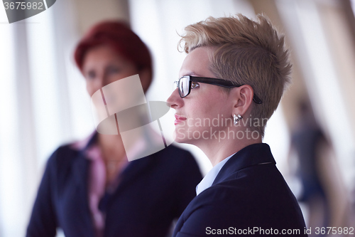 Image of business people group on meeting at modern bright office