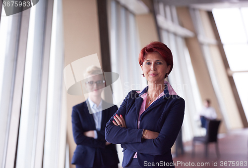 Image of business woman goup at modern bright office