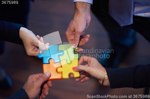 Image of assembling jigsaw puzzle