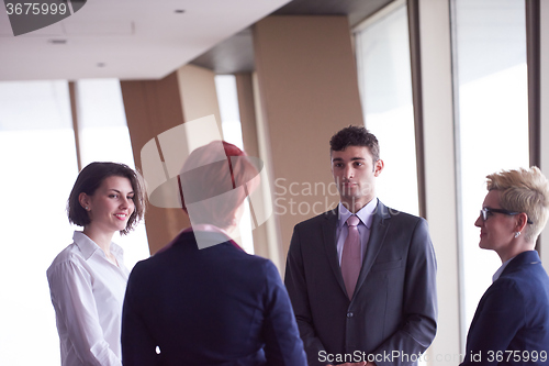 Image of business people group on meeting at modern bright office