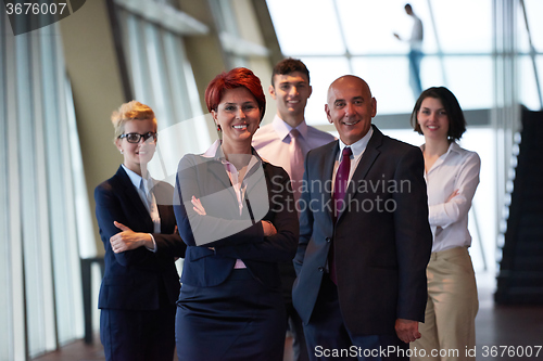 Image of diverse business people group with redhair  woman in front