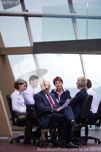 Image of business people group on meeting at modern bright office