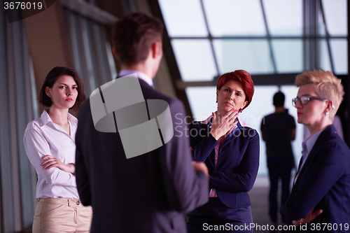Image of business people group on meeting at modern bright office